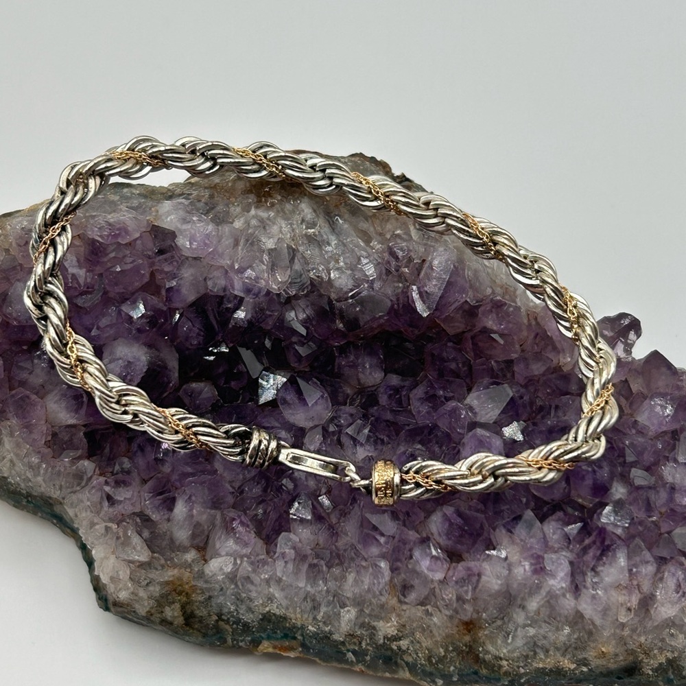 Elegant sterling silver and 14kt Gold Twisted bracelet is beautiful